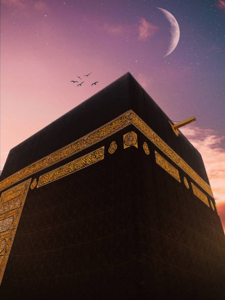 The black building of the kaaba in mecca. Kaaba with moon. Mecca,Saudi Arabia. The black building of the kaaba in mecca. Kaaba with moon. Mecca,Saudi Arabia. minaret stock pictures, royalty-free photos & images