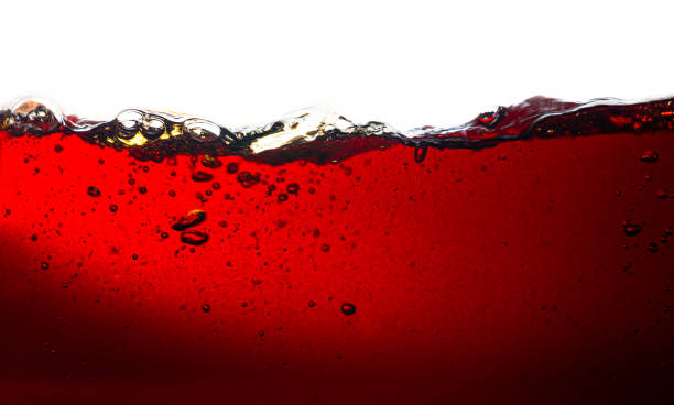 istock Cola texture isolated white background,Side view background of refreshing cola flavored soda with bubbles and ice, isolated on white. 1682883081
