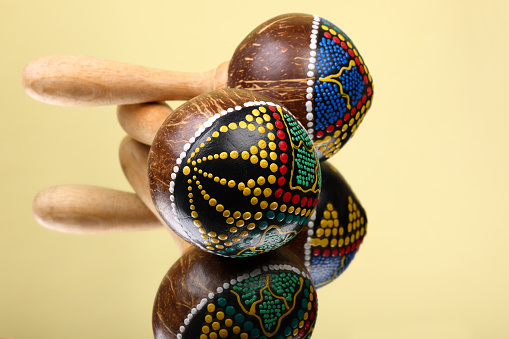 Maracas on reflective surface