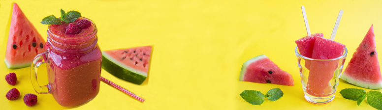 Smoothie and popsicles with watermelon on the yellow background. Copy space. Close-up.