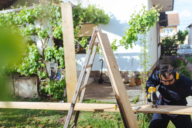 istock Male worker uses a jigsaw in the yard 1682933289