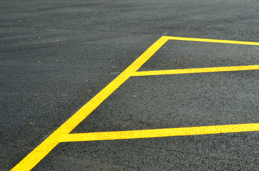 New yellow line on paving surface