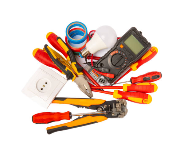 istock Electrician tools isolated on white background.Electrician tools set. Multimeter, construction tape, electrical tape, screwdrivers, pliers, LED lamp, socket, switch and automatic insulation stripper. 1682942212