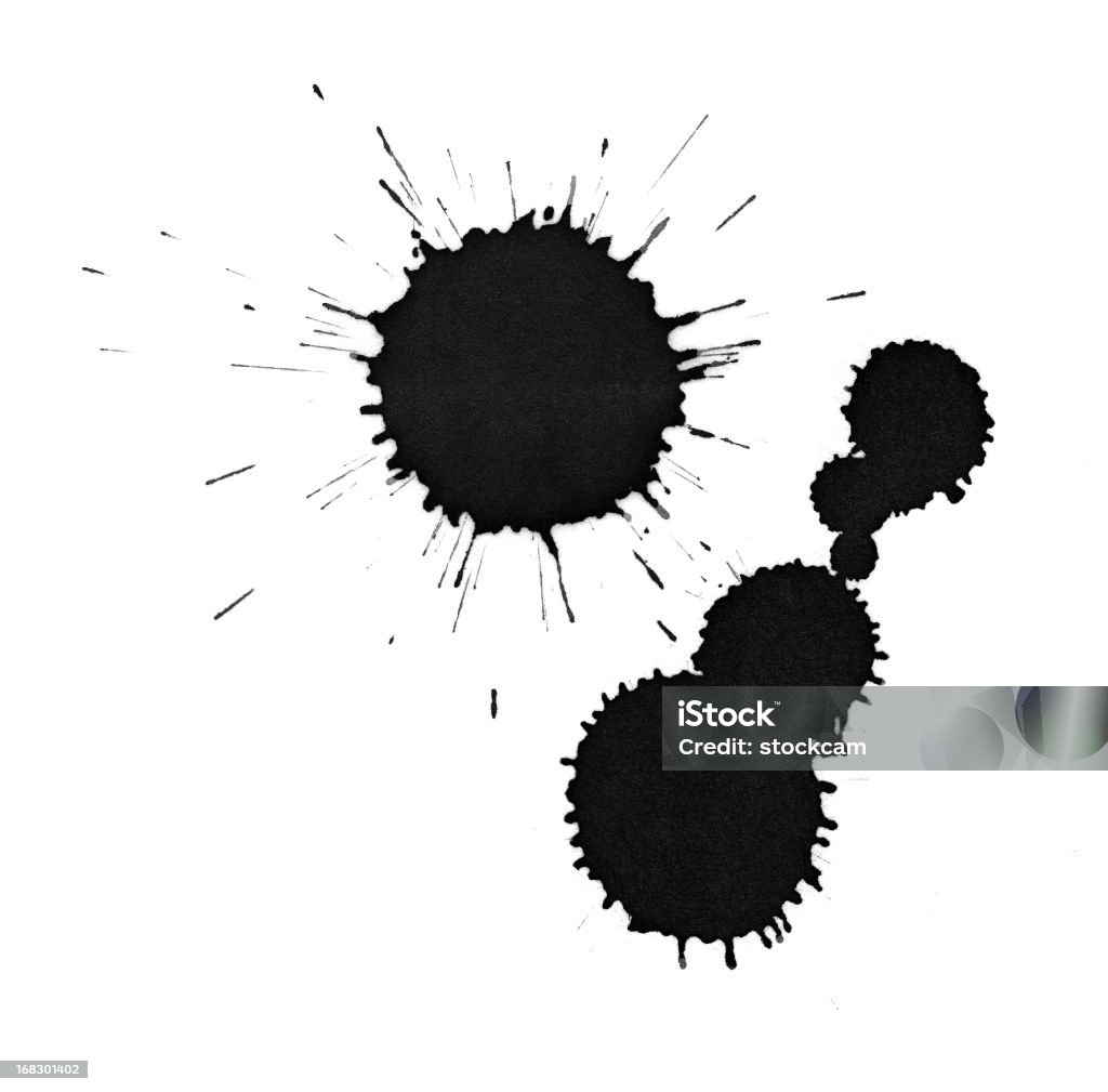 Black ink splatter drops close-up, isolated on white The dried splatter of black ink drops, isolated on white Ink Stock Photo