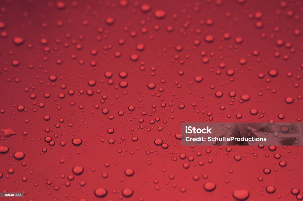 Red Water Drops Background a red water drops background. Abstract Stock Photo