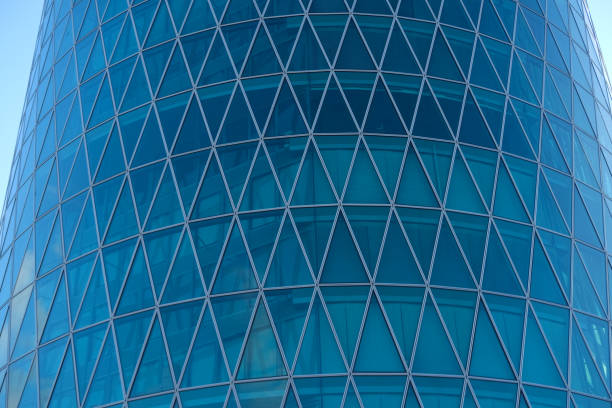 istock futuristic mirror cylindrical glass pattern Westhafen tower, 30-story skyscraper Westhafen Tower in Gutleitviertel district, Frankfurt, Germany 1683057019