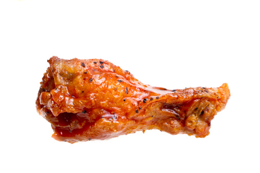 Hot wing in barbecue sauce isolated in white