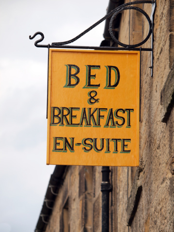 Bed and Breakfast sign on a house in England