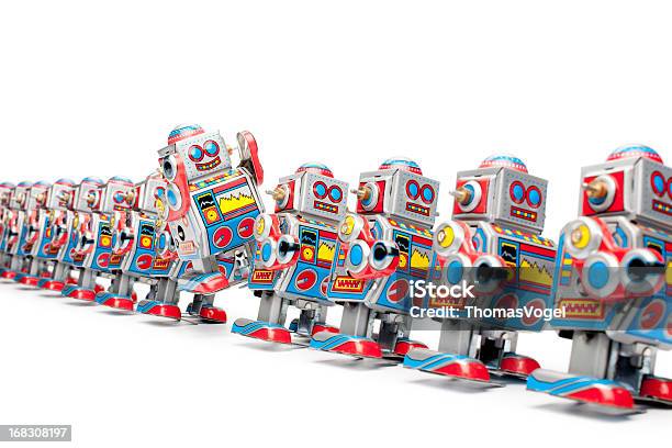 Marchando Estaño De Robots De Juguete Foto de stock y más banco de imágenes de Robot - Robot, Humor, Brazo robótico - Herramientas de fabricación
