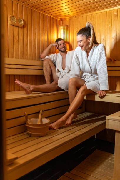 istock Young couple enjoying time in sauna 1683094793