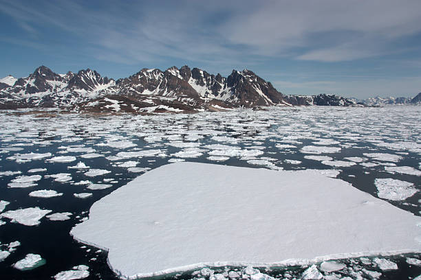 Sea Ice Sea ice breaking up in spring. Near Kulusuk, Greenland. greenland stock pictures, royalty-free photos & images