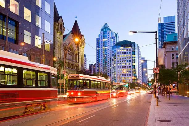 King Street with street cars in downtown Toronto