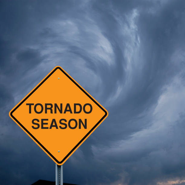 istock Caution Sign in Front of Storm Clouds 168312697