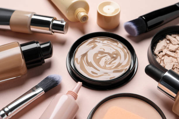 istock Different liquid foundations, beauty accessories and face powders on beige background, closeup 1683138272