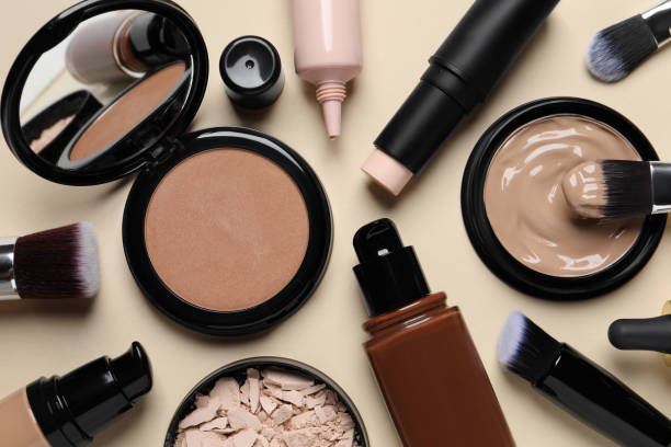 istock Liquid foundations, beauty accessories and face powders on beige background, flat lay 1683141707