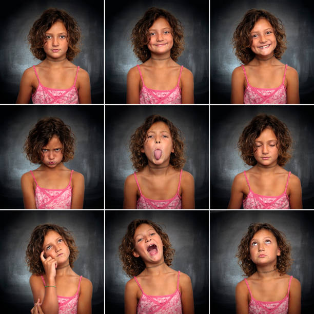 Portraits of a little girl Multiple faces of a little girl front a blackboard emotional series stock pictures, royalty-free photos & images