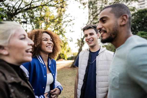 istock Friends talking on the public park 1683168509