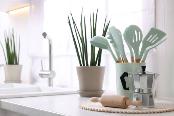istock Set of different utensils on countertop in kitchen, space for text 1683170153