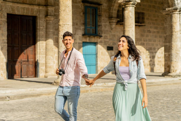 istock Young couple walking with holding hands outdoors 1683191163