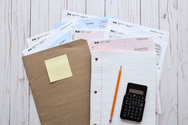 File folder with paperwork to prepare annual taxes