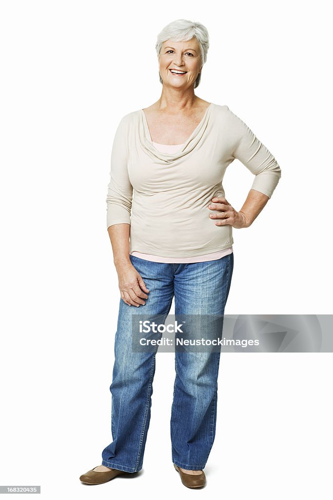Senior femme avec une main sur la hanche-isolé - Photo de Femmes seniors libre de droits