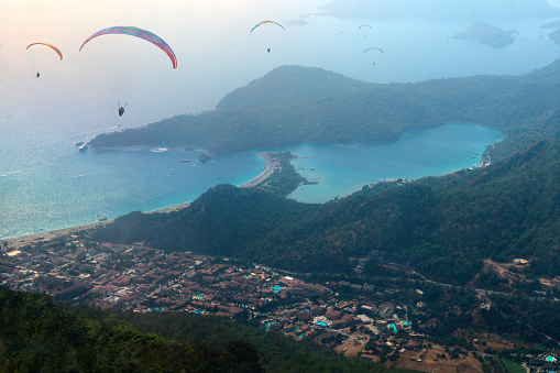 Paraglider flying in Ölüdeniz town of Fethiye, Turkey.
