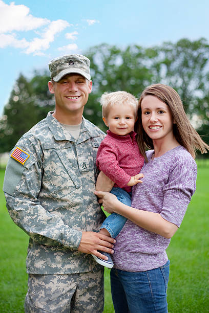 istock Army Family Series: Real American Soldier With Wife & Son 168324454