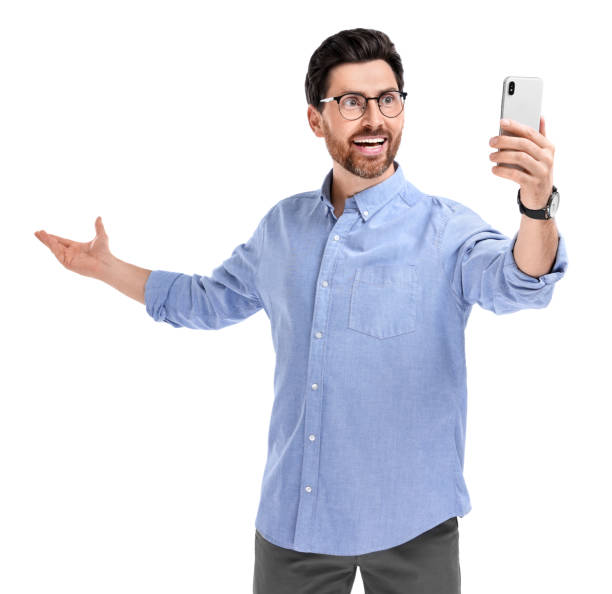 istock Smiling man taking selfie with smartphone on white background 1683245480