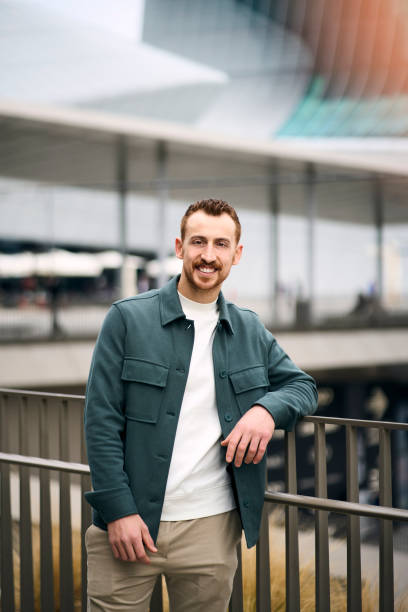 istock Vertical portrait of happy handsome smiling man looking at camera 1683303482