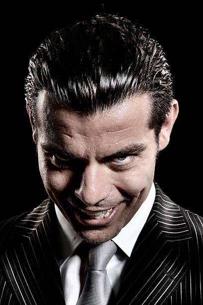 Evil businessman look Evil businessman look mafia boss stock pictures, royalty-free photos & images