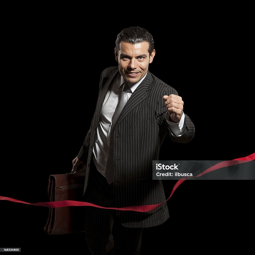 Junger Geschäftsmann preisgekrönten Rennens auf Ziellinie - Lizenzfrei Anzug Stock-Foto