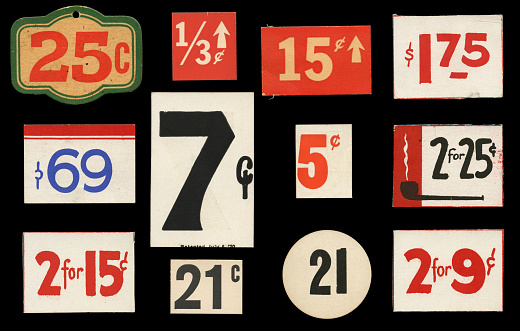 vintage price tags against a black background