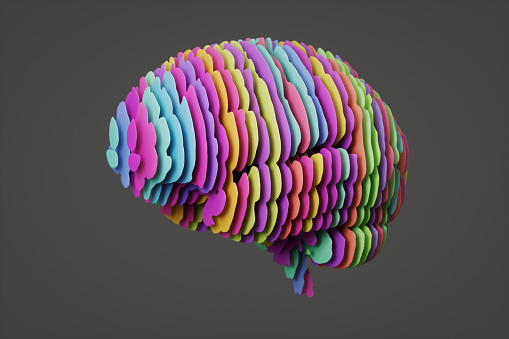 3D rendering of a human brain with colorful cutouts.