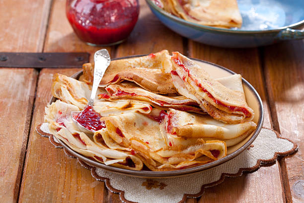 Strawberries crepes Strawberries crepes on wood table crepe stock pictures, royalty-free photos & images