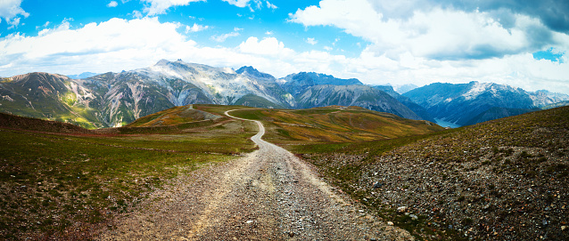 Panoramic Country Road over the Alps. Panorama made with 8 vertical images.