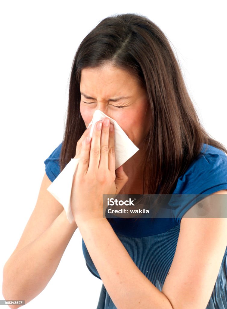 Éternuer femme avec blowrag-Frau niest Taschentuch Heuschnupfen à - Photo de Fond blanc libre de droits