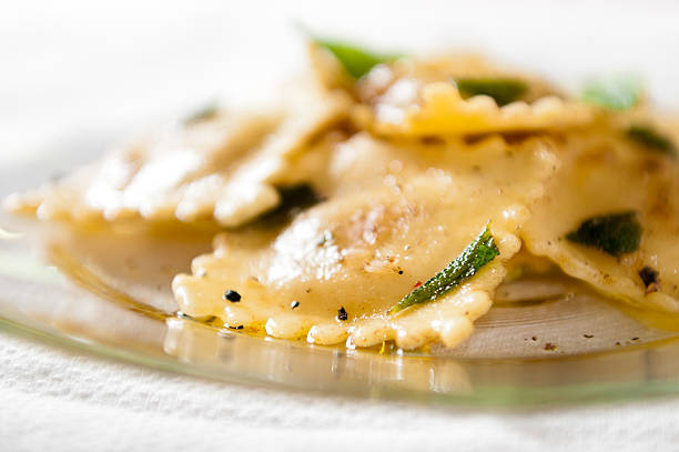 Cheese Ravioli in Brown Butter Sage Sauce stock photo