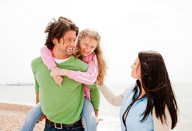 istock Happy Family Day at the Beach 168353204