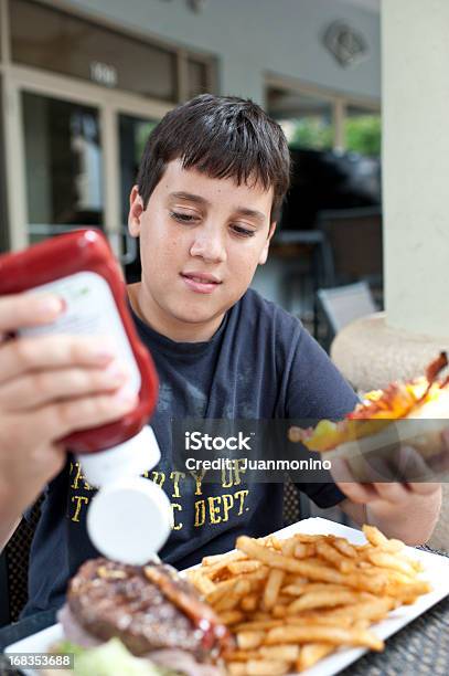 Fast Food Lover Stock Photo - Download Image Now - Child, Ketchup, Squeezing