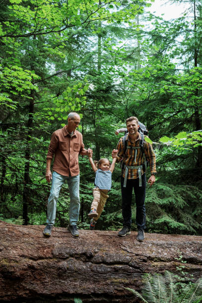 istock Three generation family enjoying nature hike 1683559301