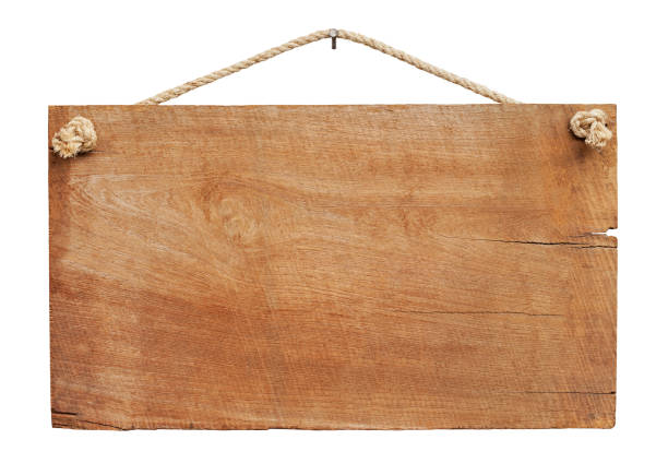 Old weathered wood signboard background. Old weathered wood sign background, hanging by old rope from a nail, isolated on white, clipping path included. hanging signboard stock pictures, royalty-free photos & images