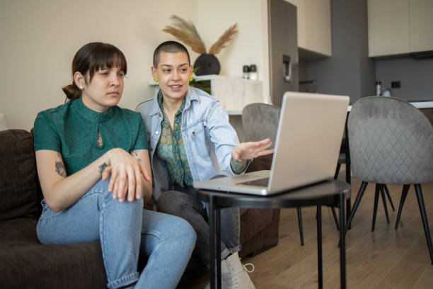 istock Two happy young women are chatting 1683582182