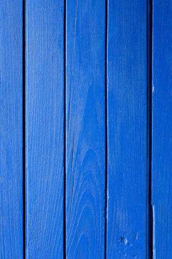 Old blue painted wooden boarding.