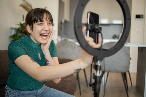 istock Young woman is recording a vlog 1683583744