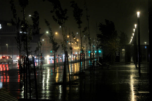 istock Lisbon Street with light by dark night  when raining 1683593772
