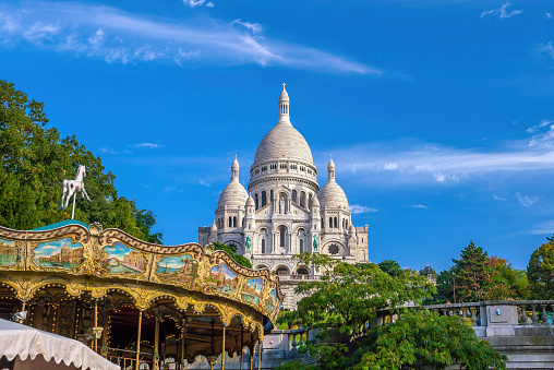 Sacre Coeur Cathedral on Montmartre Hill, Paris in France with blue sky