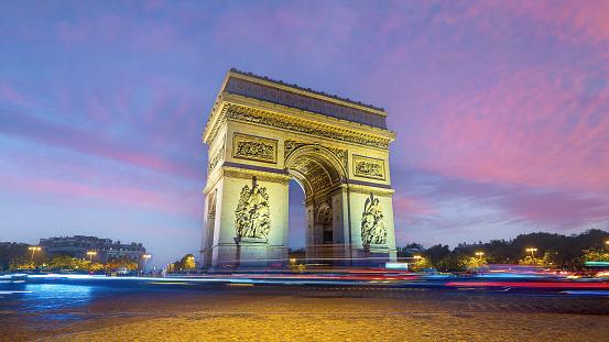 Arc de Triomphe in downtown Paris at sunset