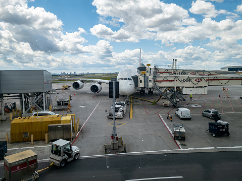 A view of an airplane waiting for takeoff at the international terminal at Toronto Pearson  International Airport, Terminal 3