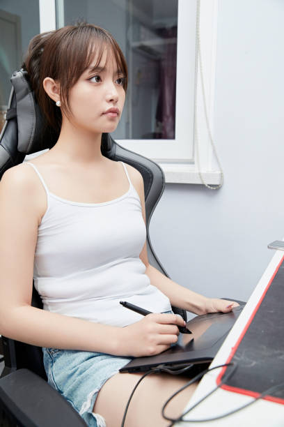 istock An Asian woman working from home on a computer 1683689285