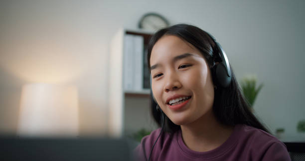 istock Asian businesswoman using computer on table to make video conference meetings 1683697963